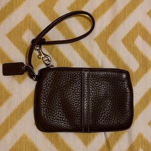 Brown leather Coach zippered pouch/ wristlet